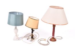Three assorted table lamps.
