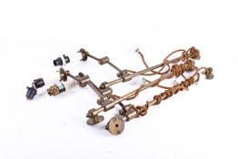 A set of three contemporary swing arm brass wall lights.
