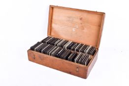Victorian mahogany magic lantern slides, portraits of celebrities and statesmen, cased.