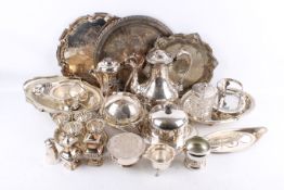 A large quantity of assorted silver plated items. Including cruets, an egg cup set and salvas, etc.