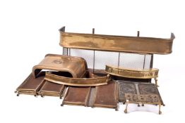 A collection of assorted brass fire side related items. Including fenders and guards, etc.