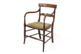 A Victorian mahogany open armchair.