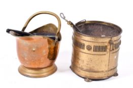 Two brass coal scuttles and some fire side tools.
