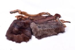 Quantity of women's assorted vintage furs. Including stoles wraps, shawl and a hand muffler, etc.