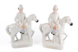 Two 'Staffordshire' flatbacks 'Hunstman' figures on horseback.