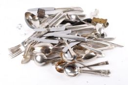 A collection of assorted silver plated flatware. Including ladles, serving spoons, etc.