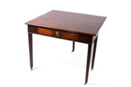 A 19th century mahogany fold over tea table.
