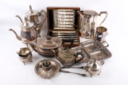 A collection of assorted silver plate. Including a canteen of fish eaters, tea pots, etc.