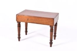 A 19th century mahogany bidet table. Raised on ring turned supports.