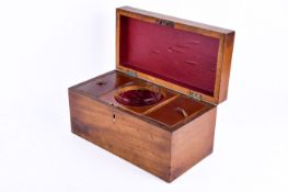 A Victorian mahogany tea caddy with Tunbridge ware decoration.
