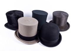 A group of five gentleman's hats.