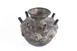 A large Mexican style metal vessel.