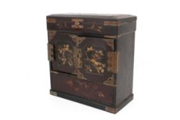 A Japanese Meiji period jewellery box. In black and gold lacquer, H22cm.