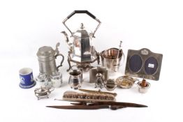 A collection of assorted silver plate. Including a spirit kettle, a small ice bucket, etc.