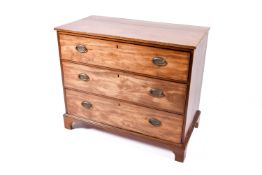 A Victorian mahogany chest of drawers. Having three graduated drawers, raised on bracket supports.