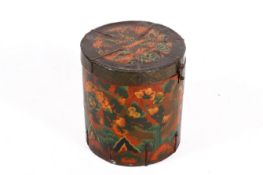 A Chinese cylindrical box with hinged cover and painted with a dragons.
