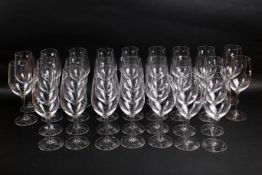 A set of thirty-two matching Riedel crystal wine glasses. H21.