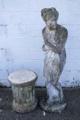 A reconstituted stone garden statue modelled as 'Pandora' with plinth. Statue H158cm.