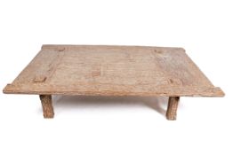 An Indonesian lime-washed teak weavers table converted to a coffee table.