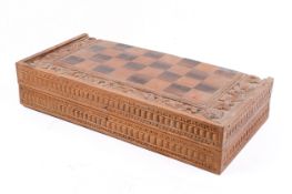 A Balinese hand carved mythology character chess set with folding board box.