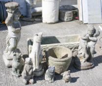 A collection of assorted reconstituted stone garden ornaments. Including a trough and a cat, etc.