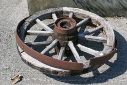 An oak cartwheel with metal strapping.