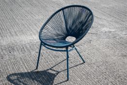 A modern retro style blue 'string' chair on metal frame.