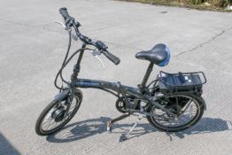 An Apollo Transport e-folding electric bike with battery, no charger, locked - no key.