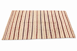 A large vintage Moroccan throw or floor covering.