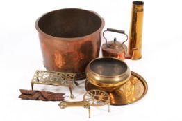 A collection of assorted brass and copper items.