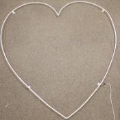 A large white metal heart with integrated LED lights. untested.