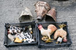A group of assorted metal garden ornaments.