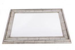 A contemporary rectangular silver coloured framed wall mirror.