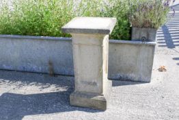 A composite stone garden rectangular plinth.