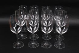A set of twelve Riedel 'Reisling' crystal wine glasses, in original box. H21.