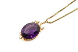 A Victorian gem set pendant and chain.