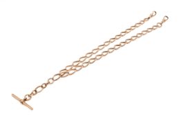 A 9ct gold watch chain and T-bar.