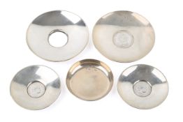 Five assorted silver dishes. One By Garrad & Co, diameter 8.