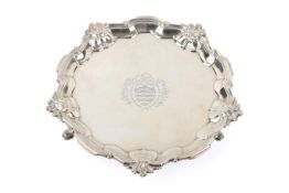 A mid-18th century decorative round silver salver.