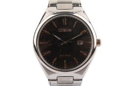 A Citizen eco-drive gents stainless steel wristwatch and cufflink set.
