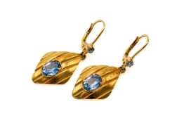 A pair of 18ct gold and topaz earrings.