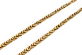 A graduated yellow metal rope chain necklace. Width at the centre circa 0.