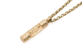 A 9ct gold chain and pendant ingot. The ingot in the form of a cut log, L3.