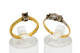 Two 18ct gold rings (stones missing).