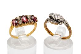 Two 18ct gold stone set rings.