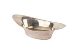 A small oval, silver dish.