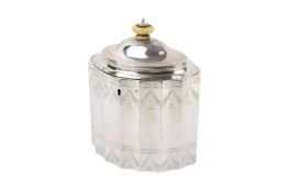 A George III silver tea caddy.