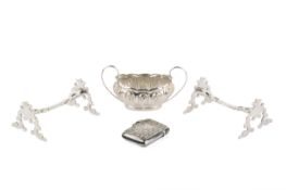 A pair of silver knife rests, a salt pot and a vesta.