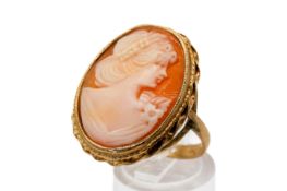 A 9ct gold mounted cameo ring. Carved with a female bust, hallmarked, circa 2.4cm x 1.