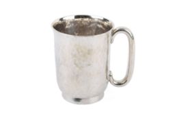 An early 20th century silver christening mug.